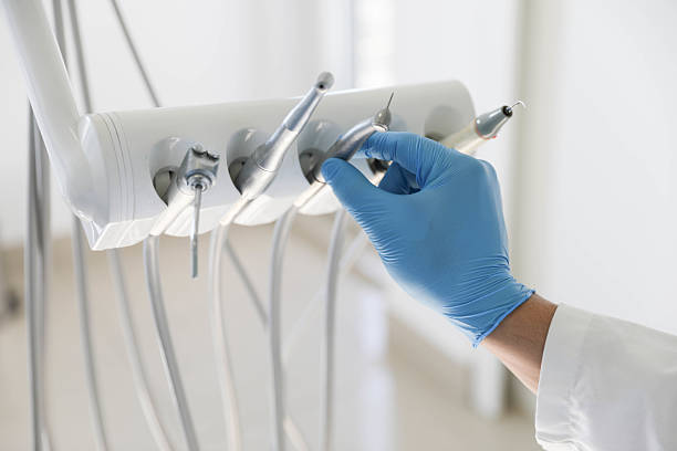 Professional Tooth Extraction technician working in Lexington, OK